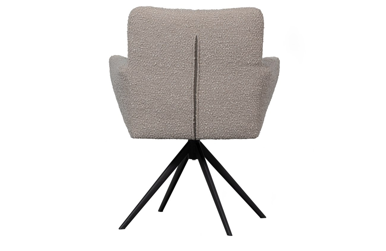 Der Esszimmerstuhl Vinny überzeugt mit seinem modernen Stil. Gefertigt wurde er aus Boucle-Stoff, welcher einen Sand Farbton besitzt. Das Gestell ist aus Metall und hat eine schwarze Farbe. Der Stuhl verfügt über eine Sitzhöhe von 46 cm und ist drehbar.