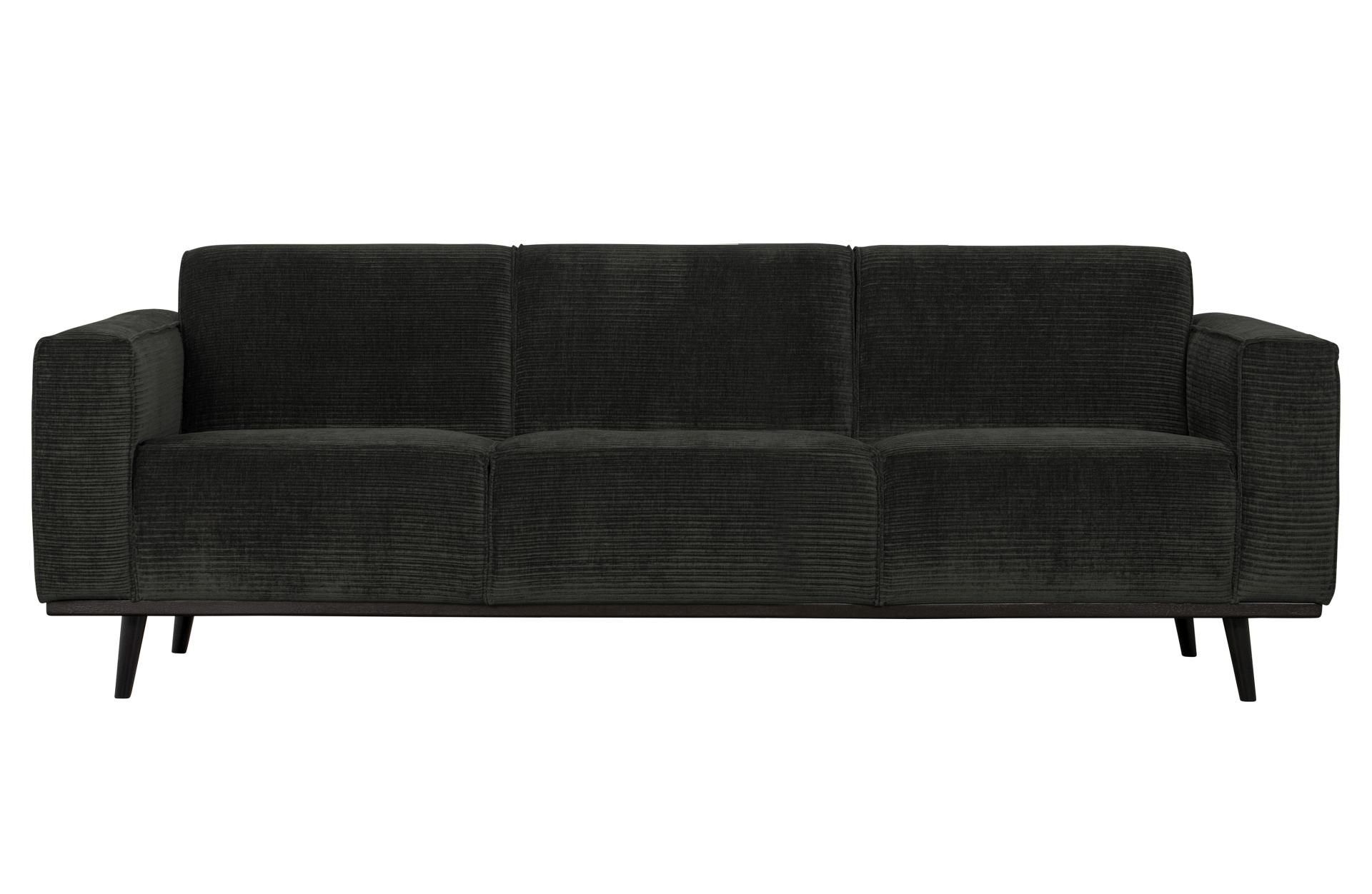 Das Sofa Statement überzeugt mit seinem modernen Design. Gefertigt wurde es aus gewebten Jacquard, welches einen Graphit Farbton besitzen. Das Gestell ist aus Birkenholz und hat eine schwarze Farbe. Das Sofa hat eine Breite von 230 cm.