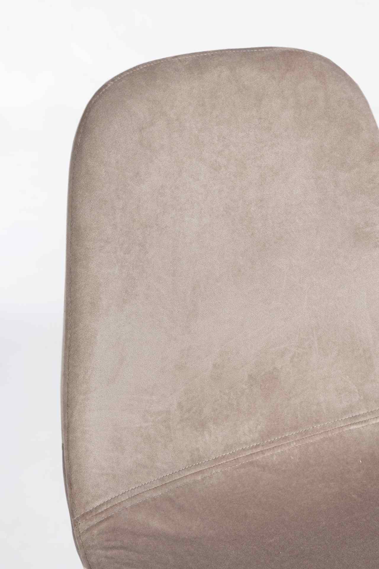 Der Esszimmerstuhl Irelia überzeugt mit seinem modernem Design. Gefertigt wurde der Stuhl aus einem Samt-Bezug, welcher einen Taupe Farbton besitzt. Das Gestell ist aus Metall und ist schwarz. Die Sitzhöhe beträgt 47 cm.