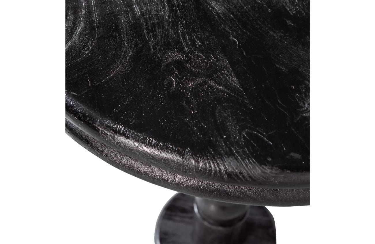 Der Bartisch Kolby überzeugt mit seinem modernen Stil. Gefertigt wurde er aus Mangoholz, welches einen schwarzen Farbton besitzt. Das Gestell ist auch aus Mangoholz. Der Bartisch besitzt eine Höhe von 105 cm und einen Durchmesser von 70 cm.