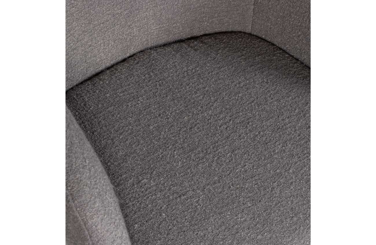 Der Esszimmerstuhl Juno überzeugt mit seinem modernen Stil. Gefertigt wurde er aus Boucle-Stoff, welcher einen dunkelgrauen Farbton besitzt. Das Gestell ist aus Metall und hat eine schwarze Farbe. Der Stuhl verfügt über eine Sitzhöhe von 49 cm.