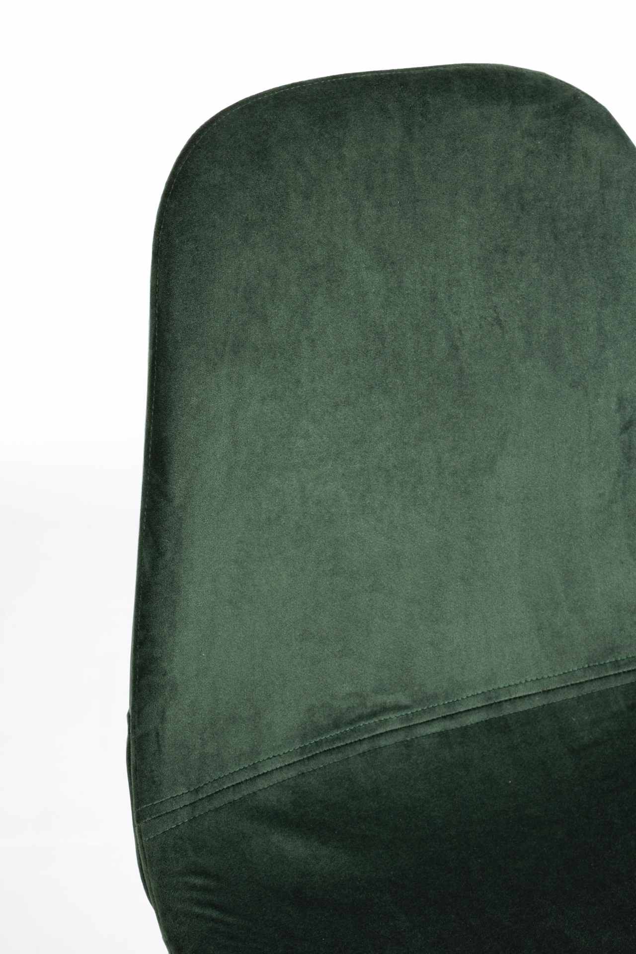 Der Esszimmerstuhl Irelia überzeugt mit seinem modernem Design. Gefertigt wurde der Stuhl aus einem Samt-Bezug, welcher einen dunkelgrünen Farbton besitzt. Das Gestell ist aus Metall und ist schwarz. Die Sitzhöhe beträgt 47 cm.