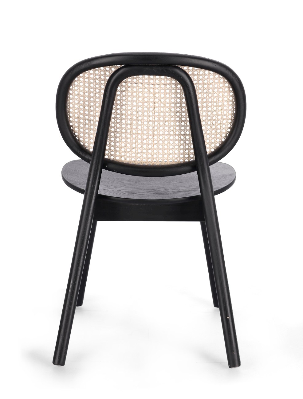 Der Esszimmerstuhl Adolis überzeugt mit seinem modernen Stil. Gefertigt wurde er aus Ulmmenholz, welcher einen schwarzen Farbton besitzt. Die Rückenlehne ist aus Rattan und hat eine natürliche Farbe. Der Stuhl besitzt eine Sitzhöhe von 46 cm.
