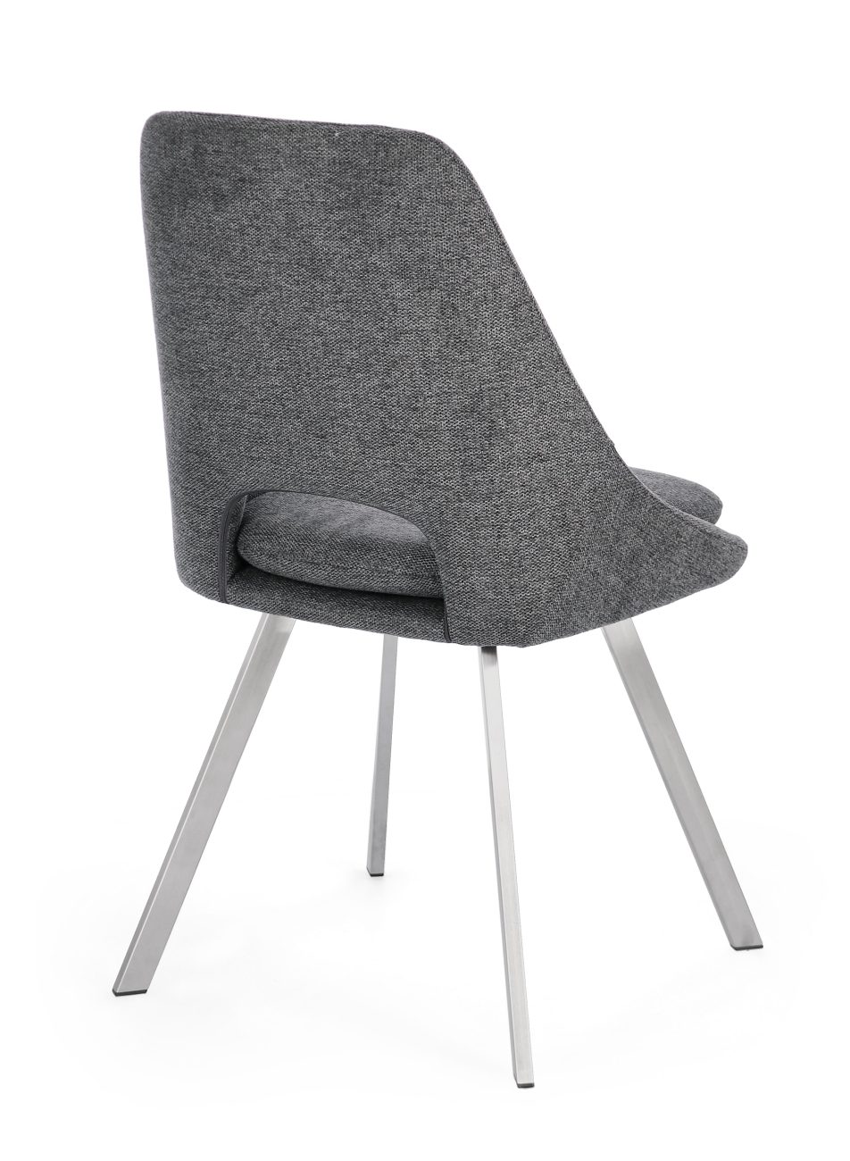 Der Esszimmerstuhl Kashar überzeugt mit seinem modernen Stil. Gefertigt wurde er aus Stoff, welcher einen dunkelgrauen Farbton besitzt. Das Gestell ist aus Edelstahl und hat eine silberne Farbe. Der Stuhl besitzt eine Sitzhöhe von 49 cm.