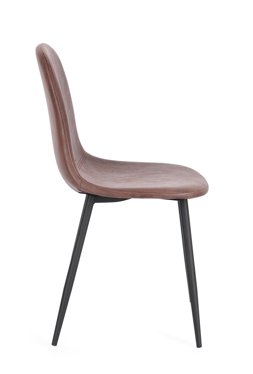 Der Esszimmerstuhl Irelia überzeugt mit seinem modernen Stil. Gefertigt wurde er aus Kunstleder, welches einen Coganc Farbton besitzt. Das Gestell ist aus Metall und hat eine Schwarzen Farbe. Der Stuhl besitzt eine Sitzhöhe von 47 cm.