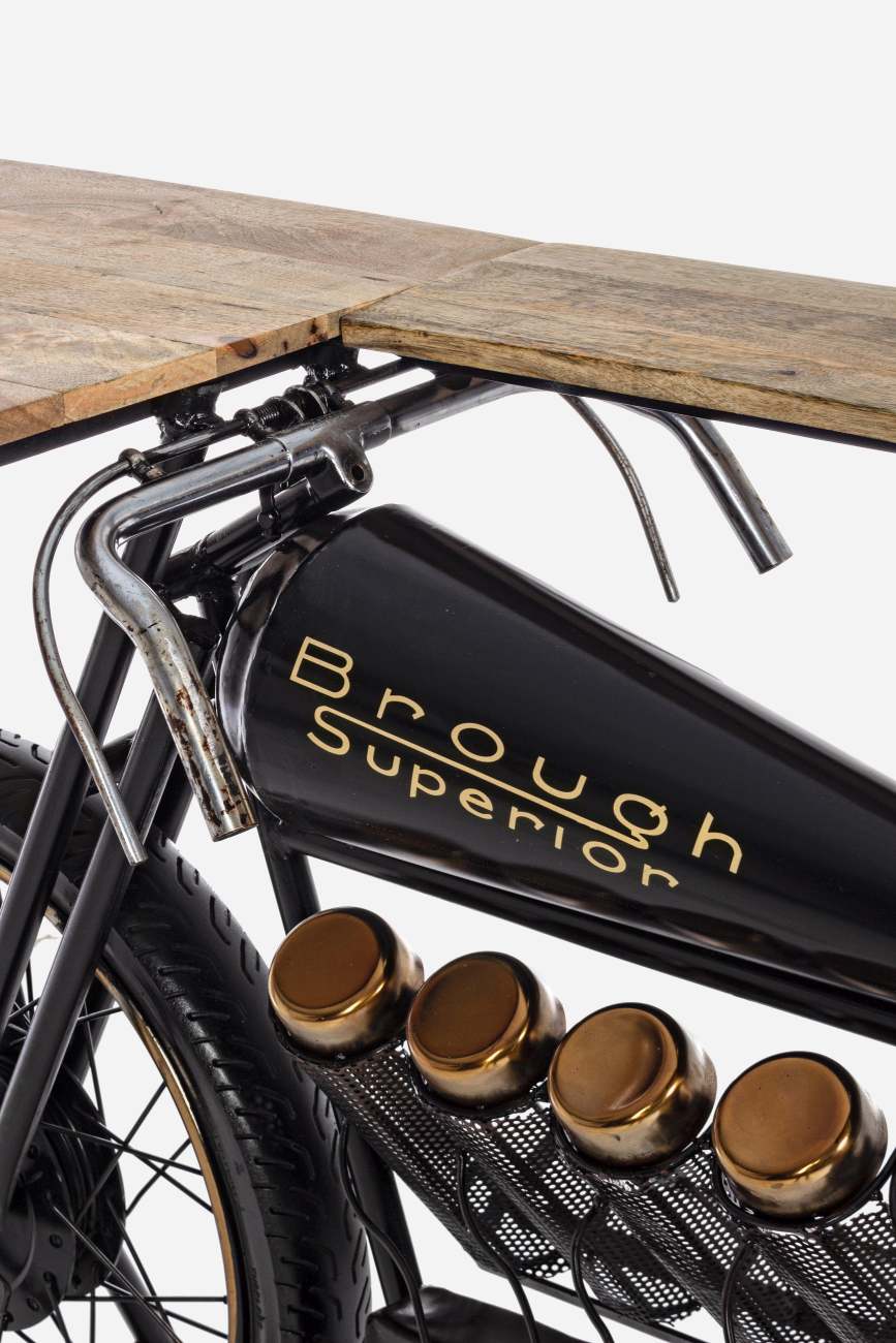 Der Bartisch Motorrad überzeugt mit seinem modernen Stil. Gefertigt wurde er aus einer Mangoholz-Platte, welche einen braunen Farbton besitzt. Das Gestell ist aus Metall und hat eine schwarze Farbe.