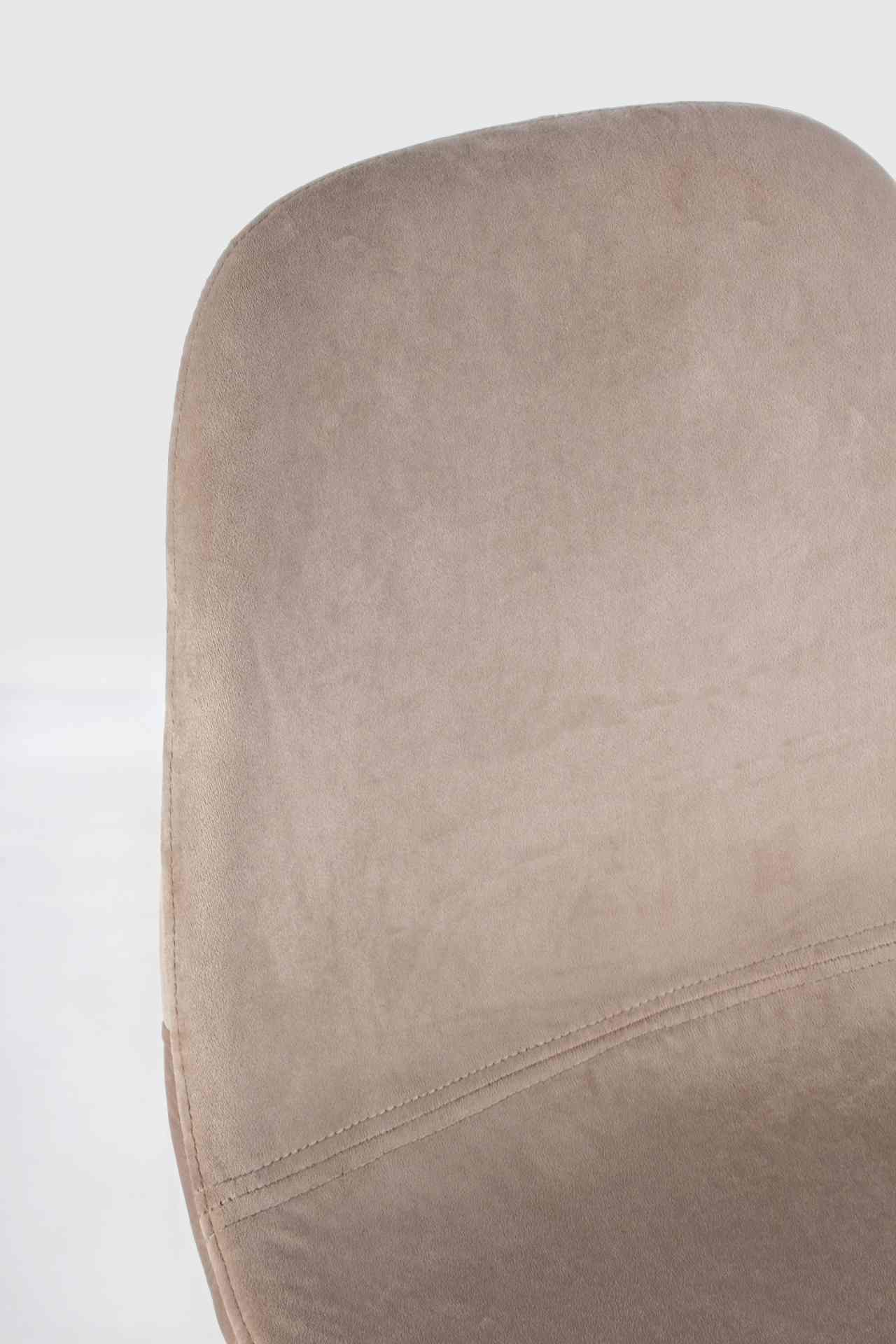 Der Barhocker Irelia überzeugt mit seinem moderndem Design. Gefertigt wurde er aus Samt, welches einen Taupe Farbton besitzt. Das Gestell ist aus Metall und hat eine schwarze Farbe. Die Sitzhöhe des Hockers beträgt 76 cm.
